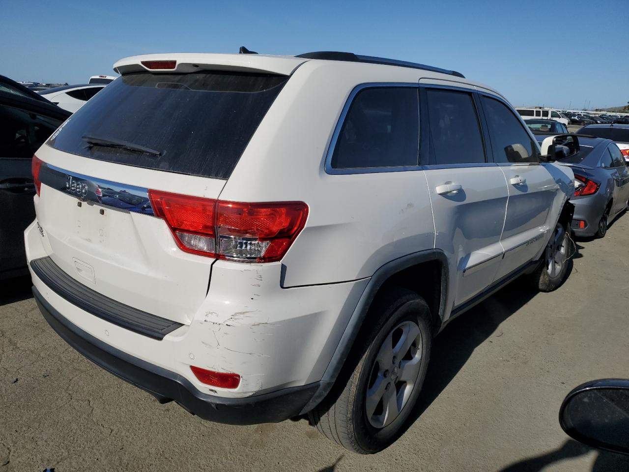 1C4RJFAG5CC290273 2012 Jeep Grand Cherokee Laredo