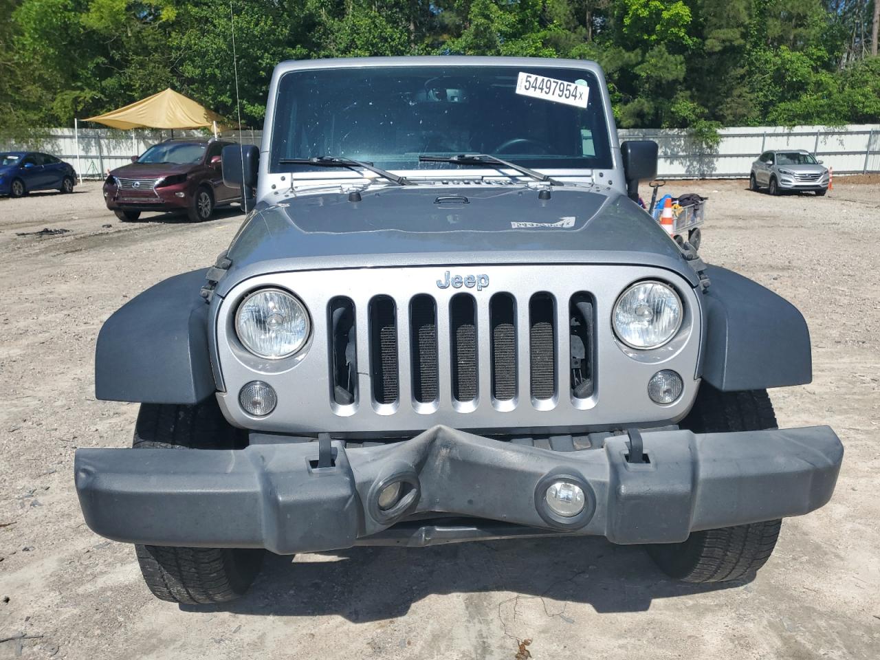 1C4BJWDG6FL765110 2015 Jeep Wrangler Unlimited Sport