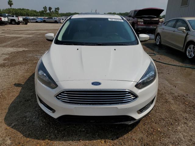 2017 Ford Focus Titanium VIN: 1FADP3N24HL272432 Lot: 57122314