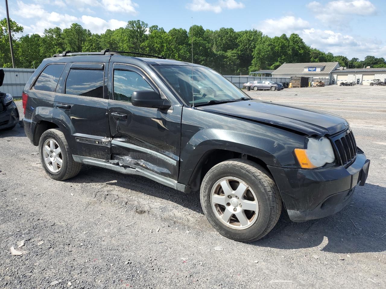 1J8GR48K99C555115 2009 Jeep Grand Cherokee Laredo