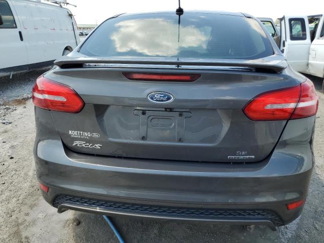 2016 Ford Focus Se VIN: 1FADP3F24GL202295 Lot: 55556614