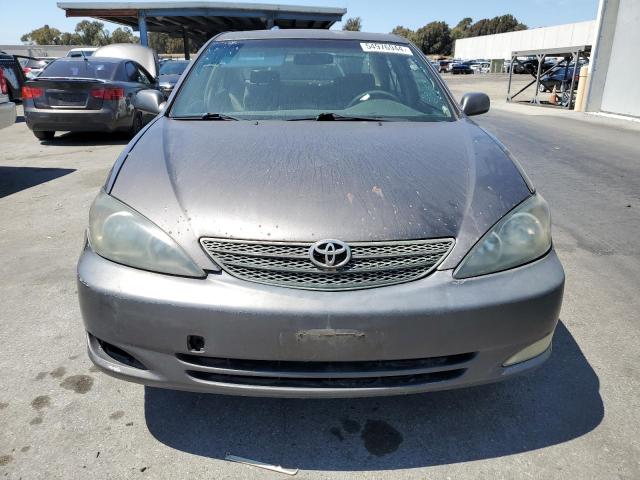 2002 Toyota Camry Le VIN: JTDBE32K920037951 Lot: 54976944