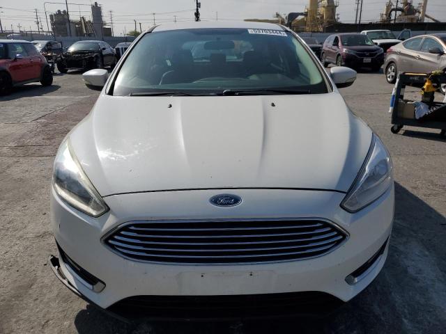 2016 Ford Focus Titanium VIN: 1FADP3N28GL405580 Lot: 53703444