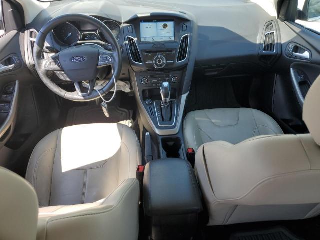 2016 Ford Focus Titanium VIN: 1FADP3N24GL332675 Lot: 56720784