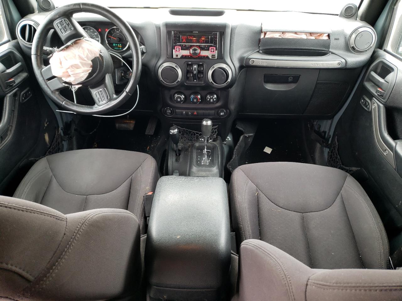 1C4BJWDG0EL277303 2014 Jeep Wrangler Unlimited Sport