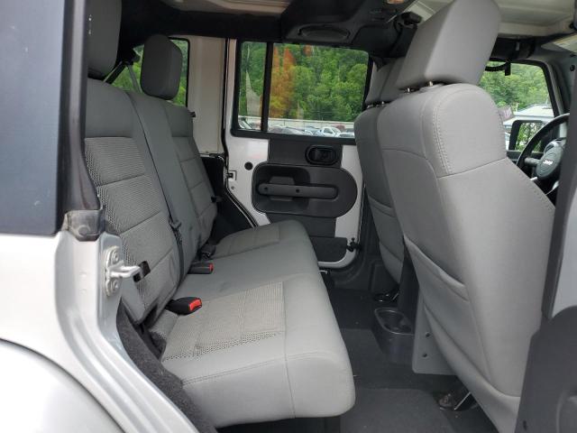 2009 Jeep Wrangler Unlimited Sahara VIN: 1J4GA59139L772387 Lot: 56562154