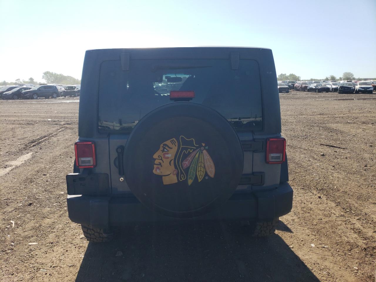 1C4BJWDG1FL773583 2015 Jeep Wrangler Unlimited Sport