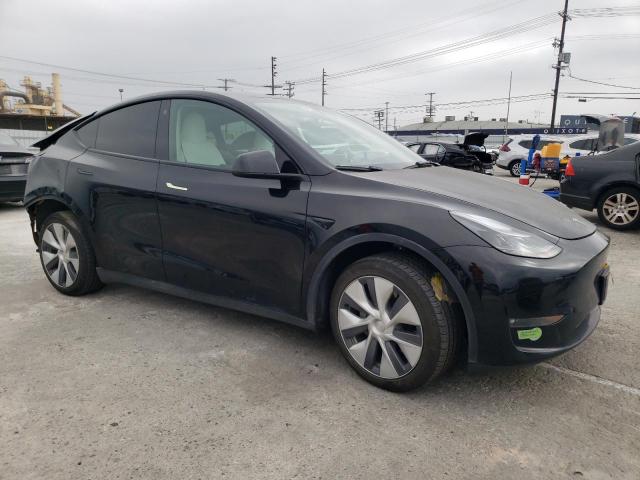 2023 Tesla Model Y VIN: 7SAYGAEE9PF682934 Lot: 54261674