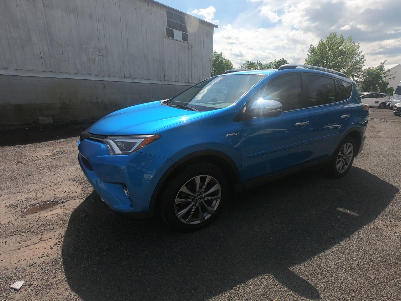 2016 Toyota Rav4 Hv Limited vin: JTMDJREVXGD017074