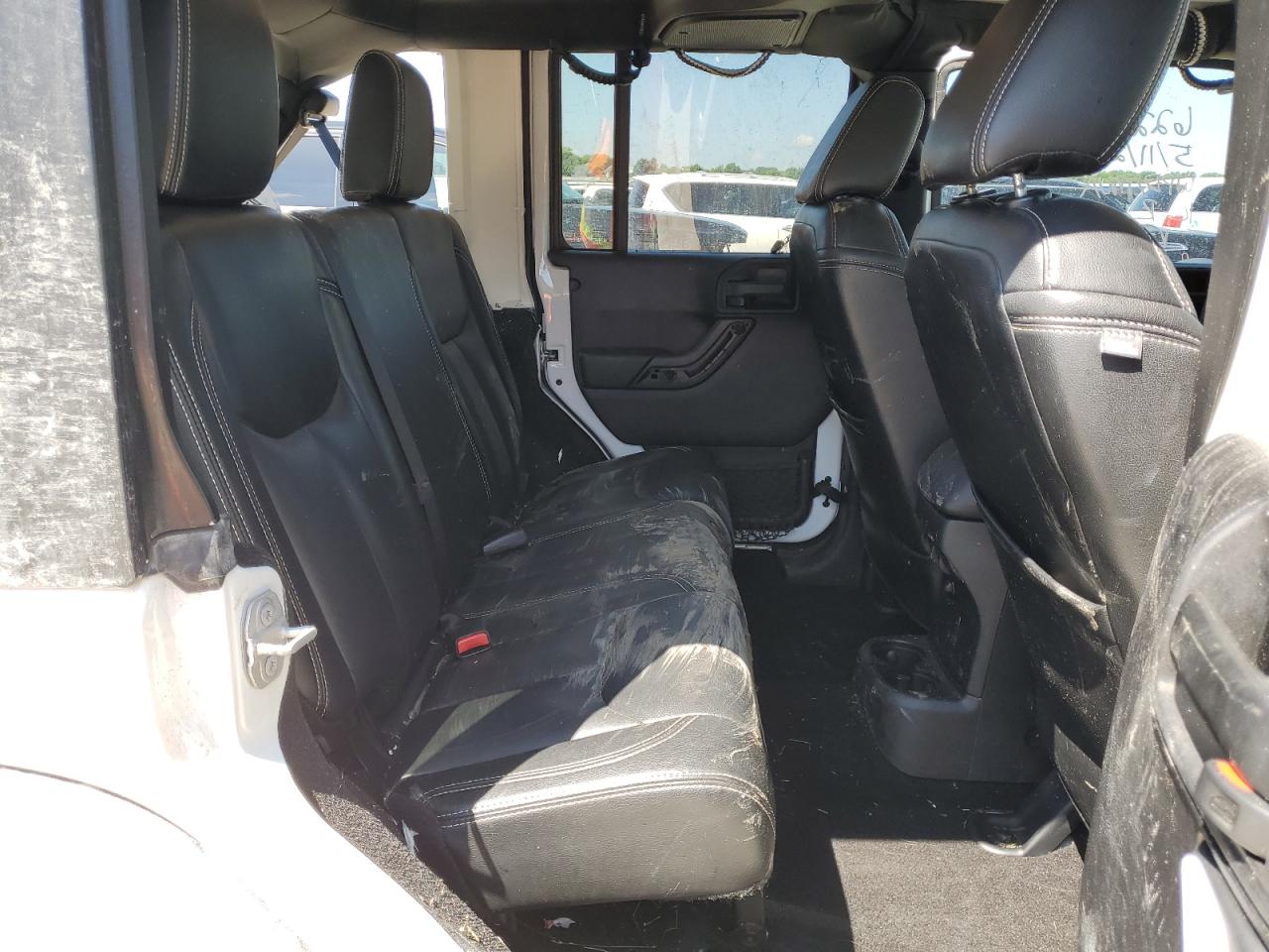 1C4HJWDG2GL202048 2016 Jeep Wrangler Unlimited Sport