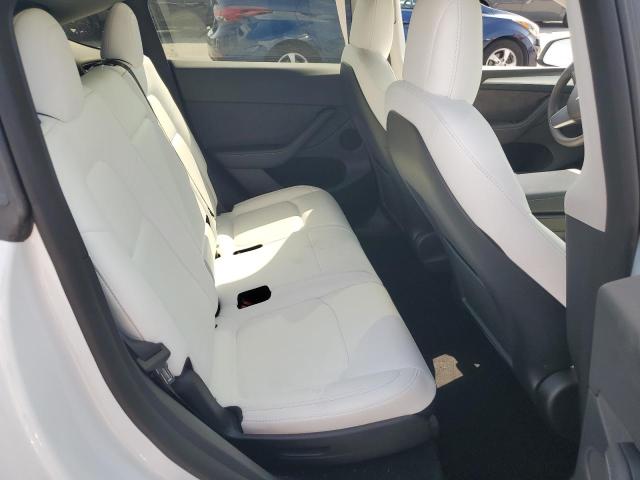 2023 Tesla Model Y VIN: 7SAYGAEE1PF647580 Lot: 49114094