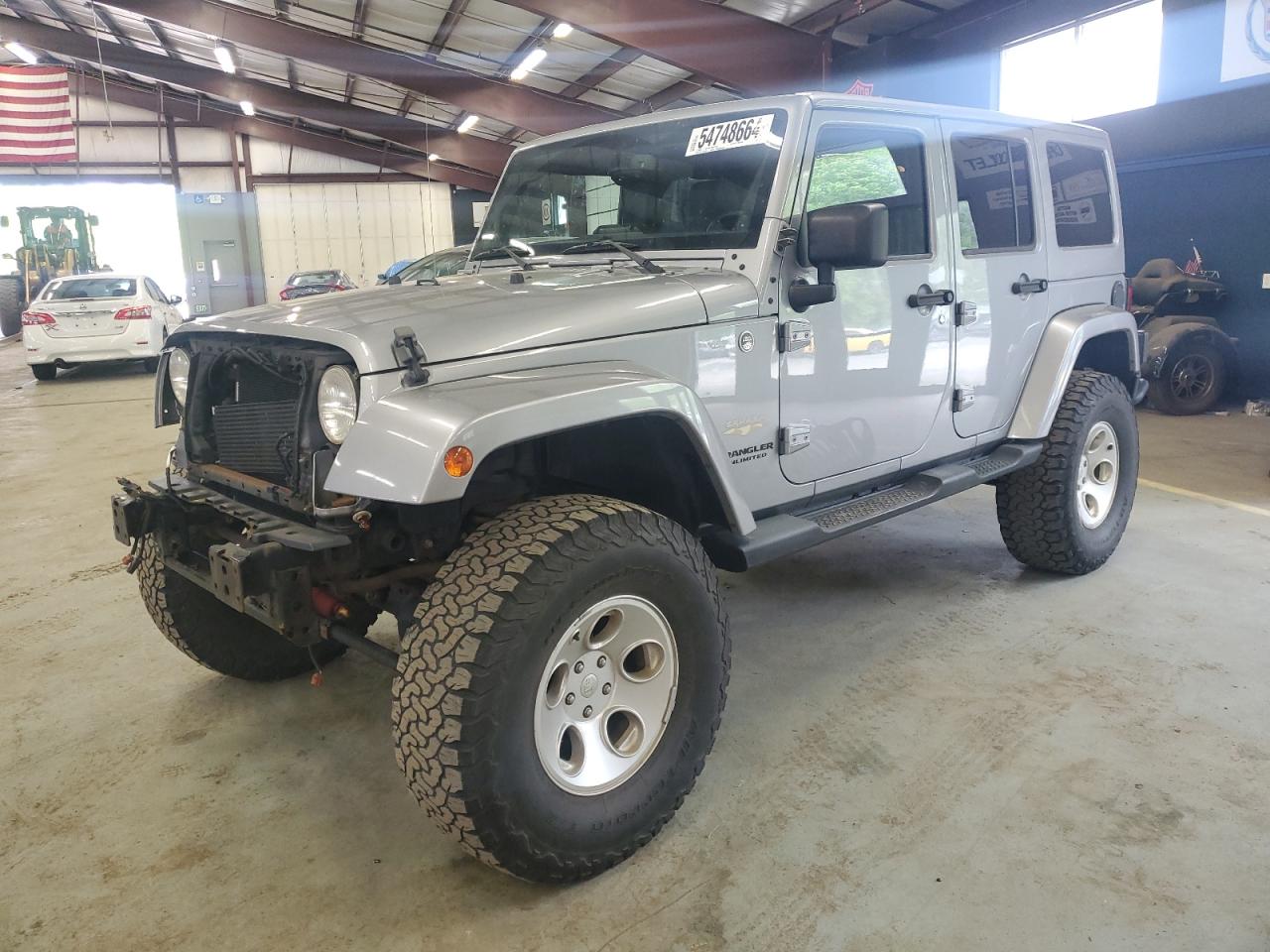 1C4BJWEGXEL253699 2014 Jeep Wrangler Unlimited Sahara