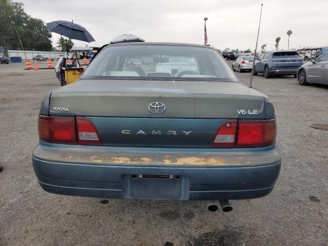 1996 Toyota Camry Le VIN: 4T1BF12K0TU869878 Lot: 53446544