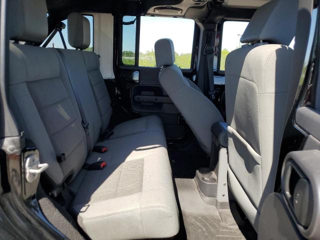 2009 Jeep Wrangler Unlimited Sahara VIN: 1J4GA591X9L770796 Lot: 56819804