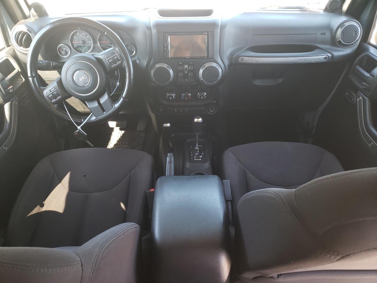 1C4BJWDG7EL289352 2014 Jeep Wrangler Unlimited Sport