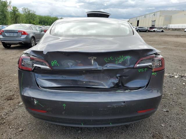 2018 Tesla Model 3 VIN: 5YJ3E1EB7JF065980 Lot: 56922874