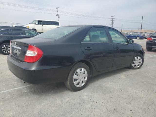 2002 Toyota Camry Le VIN: JTDBE32K320019347 Lot: 56772384