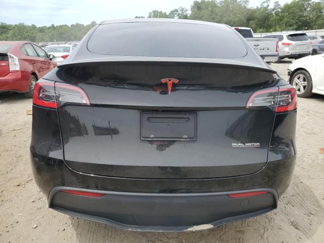 2021 Tesla Model Y VIN: 5YJYGDEF6MF099014 Lot: 57104624