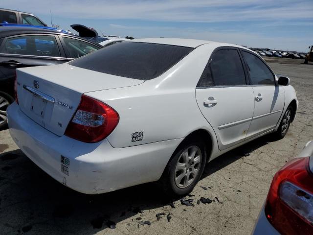 2004 Toyota Camry Le VIN: JTDBF32KX40154910 Lot: 56761174