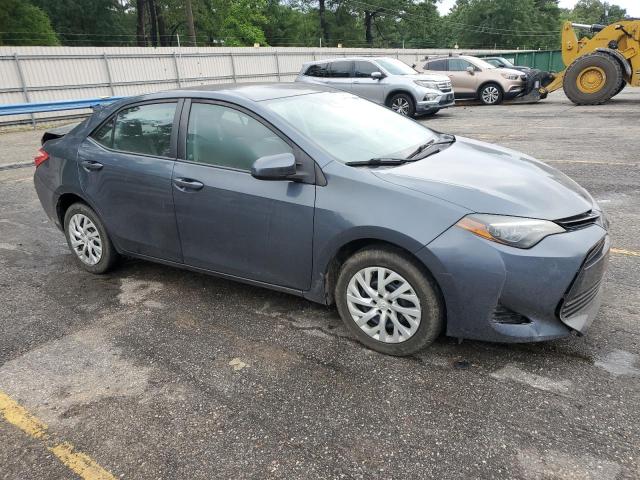 VIN 5YFBURHE1HP686584 2017 Toyota Corolla, L no.4