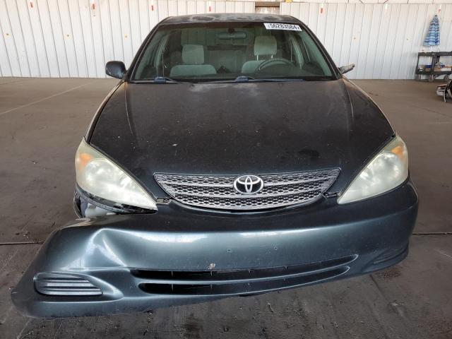 2004 Toyota Camry Le VIN: 4T1BE32K94U308210 Lot: 56283584