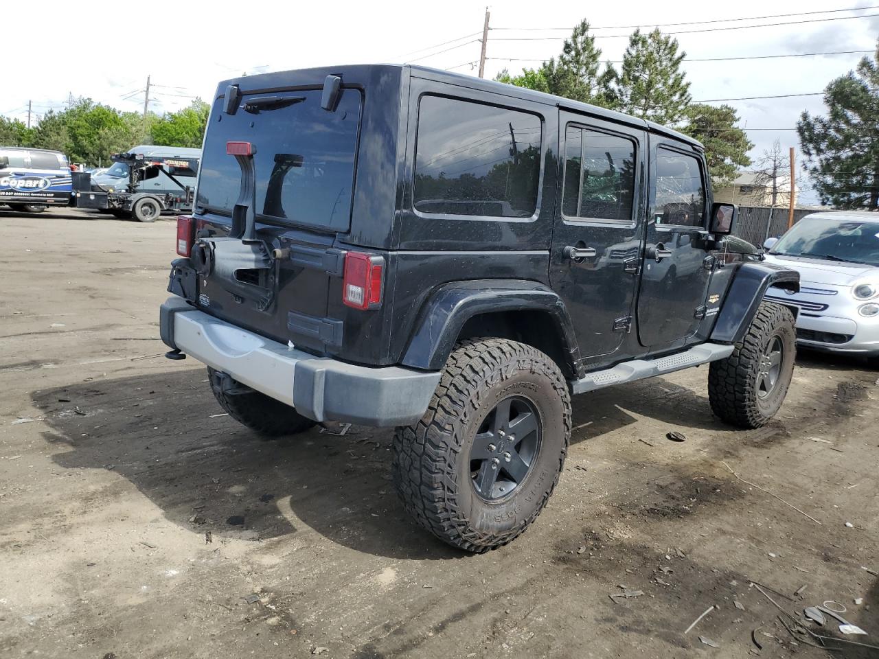 1J4HA5H10BL633605 2011 Jeep Wrangler Unlimited Sahara