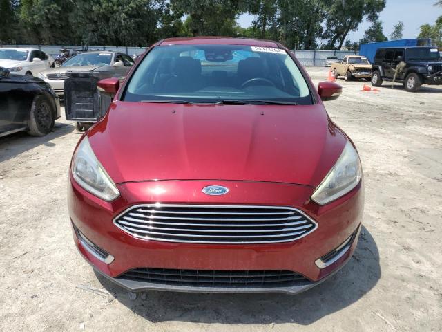 2016 Ford Focus Titanium VIN: 1FADP3J29GL384745 Lot: 54924264