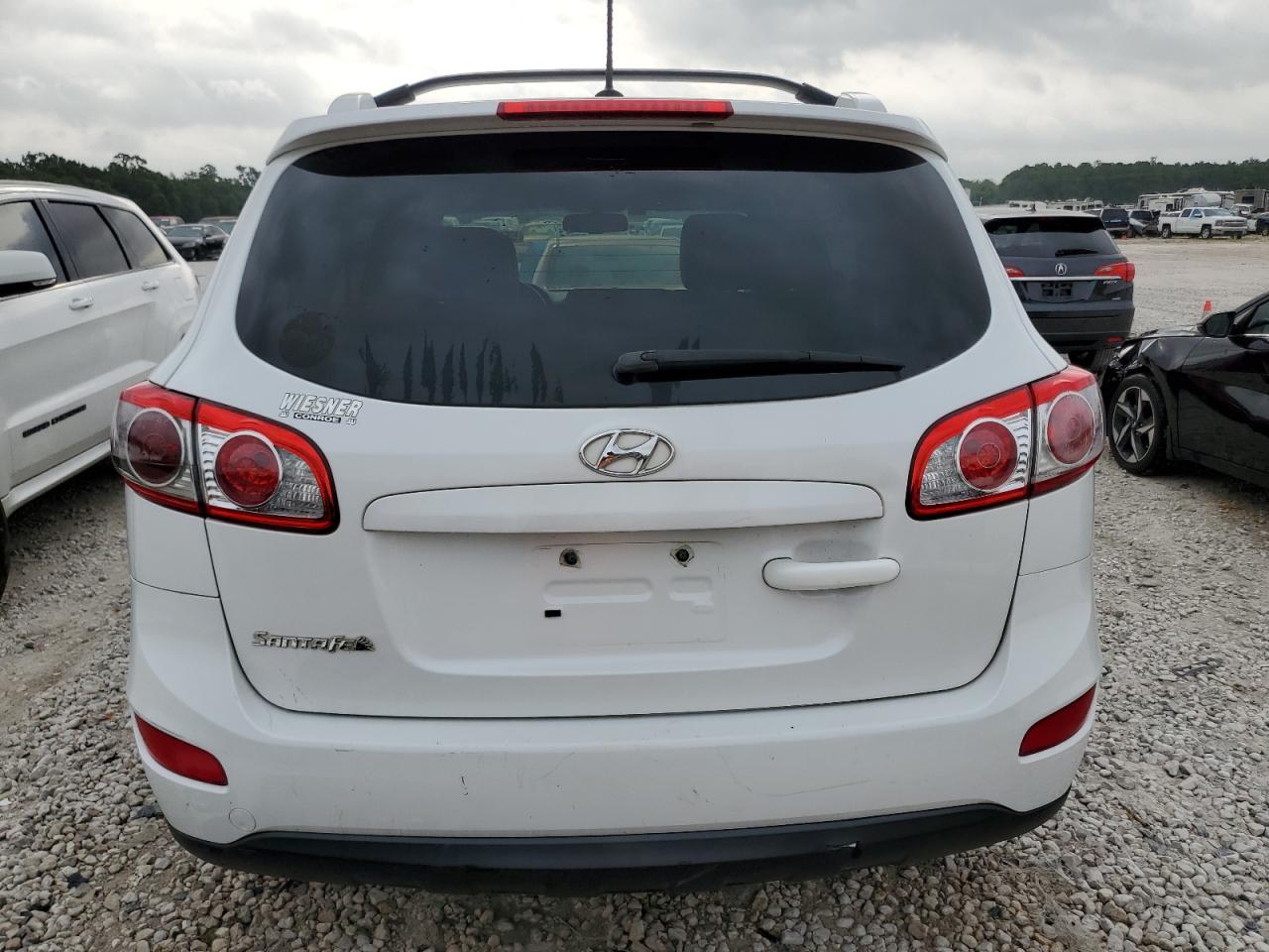 5XYZH4AG6CG124310 2012 Hyundai Santa Fe Se