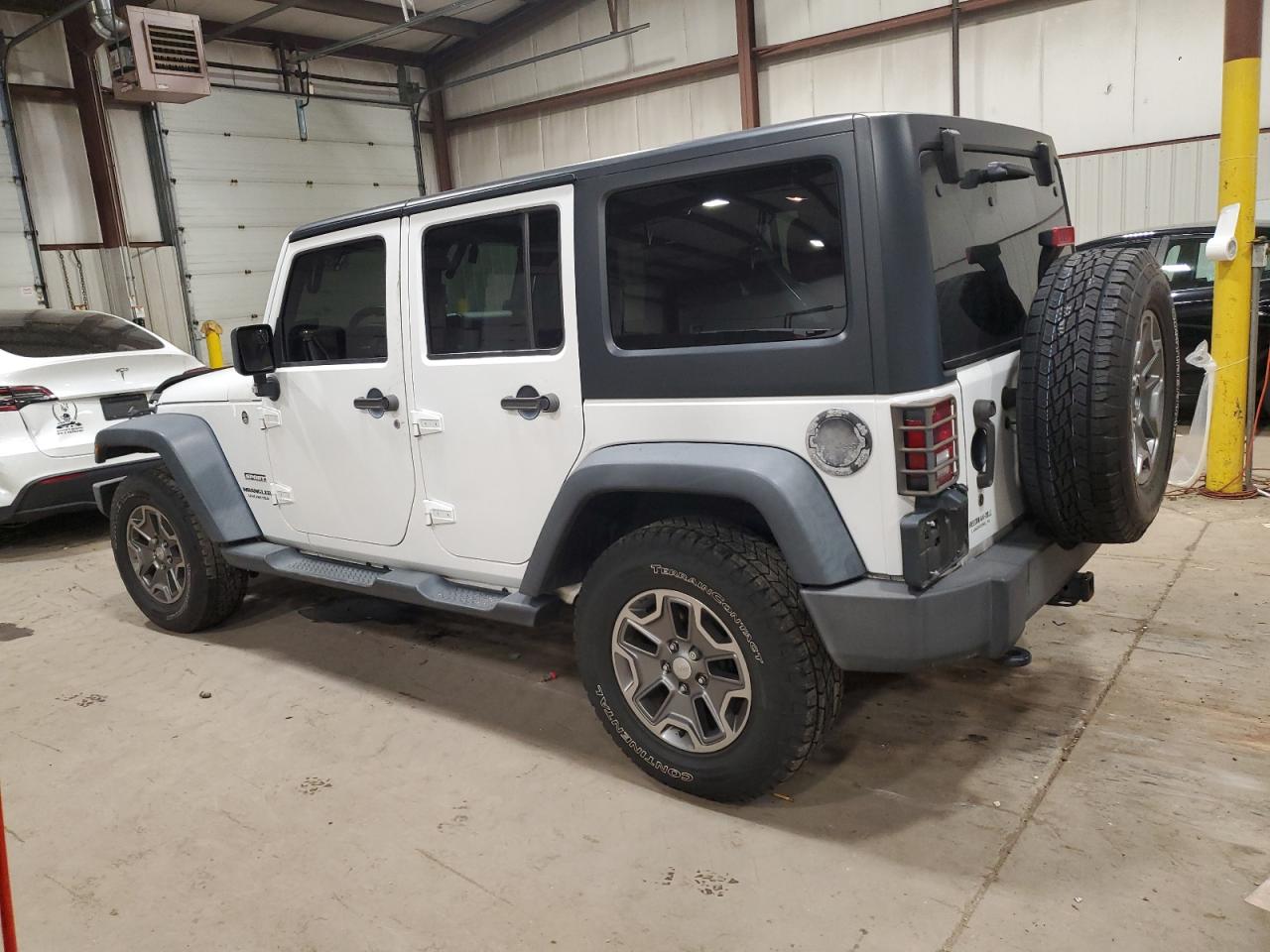 1C4HJWDG3EL305122 2014 Jeep Wrangler Unlimited Sport