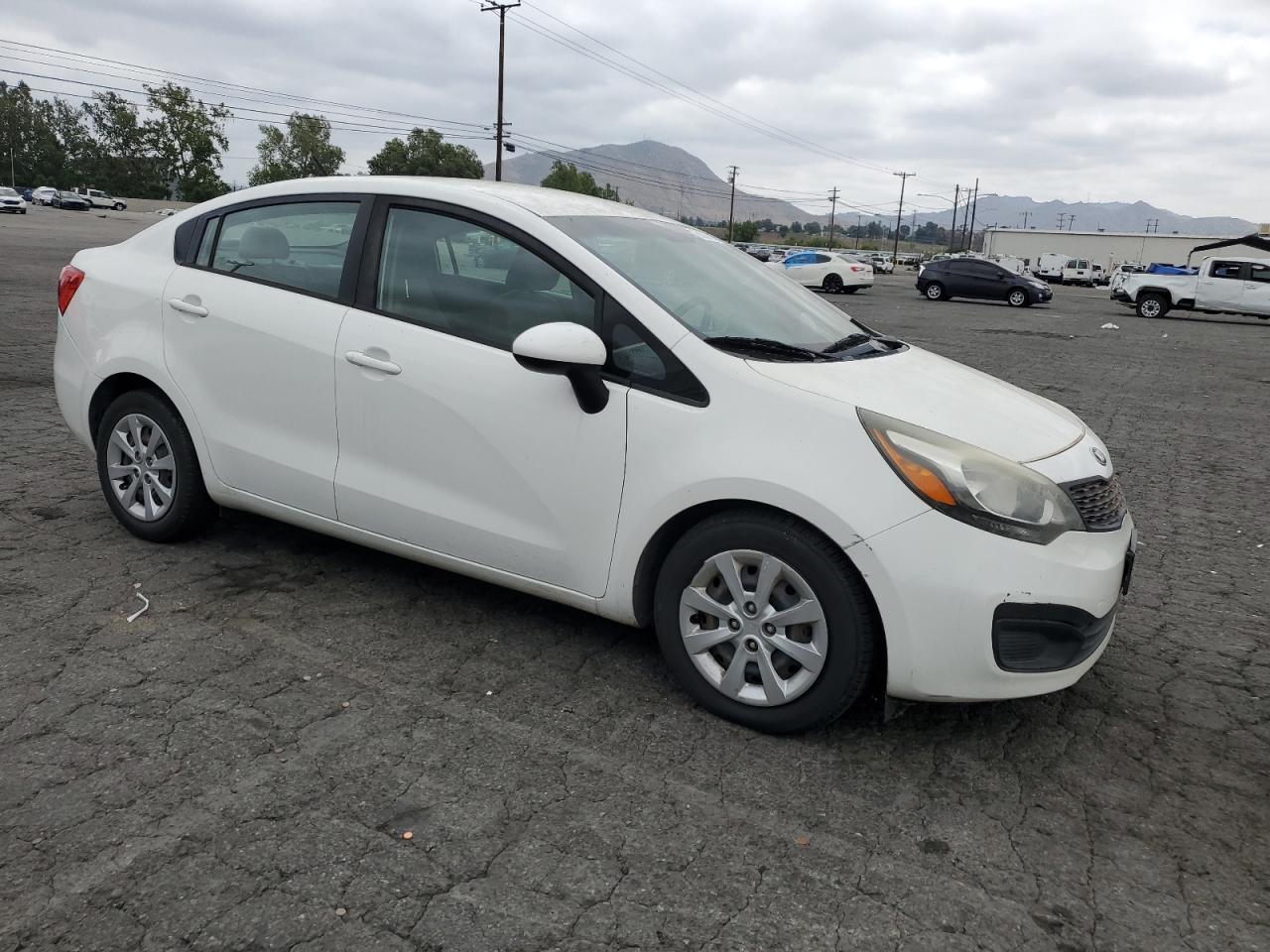 KNADM4A36E6377553 2014 Kia Rio Lx