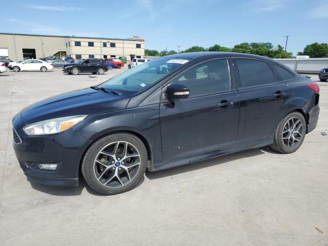 FORD FOCUS SE 2016 black sedan 4d gas 1FADP3F25GL258133 photo #1