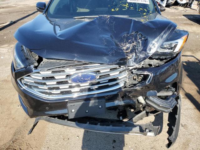 2021 Ford Edge Titanium VIN: 2FMPK4K97MBA27286 Lot: 56057174