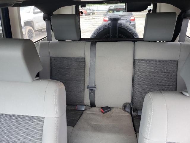 2010 Jeep Wrangler Unlimited Sahara VIN: 1J4BA5H11AL122425 Lot: 54323234