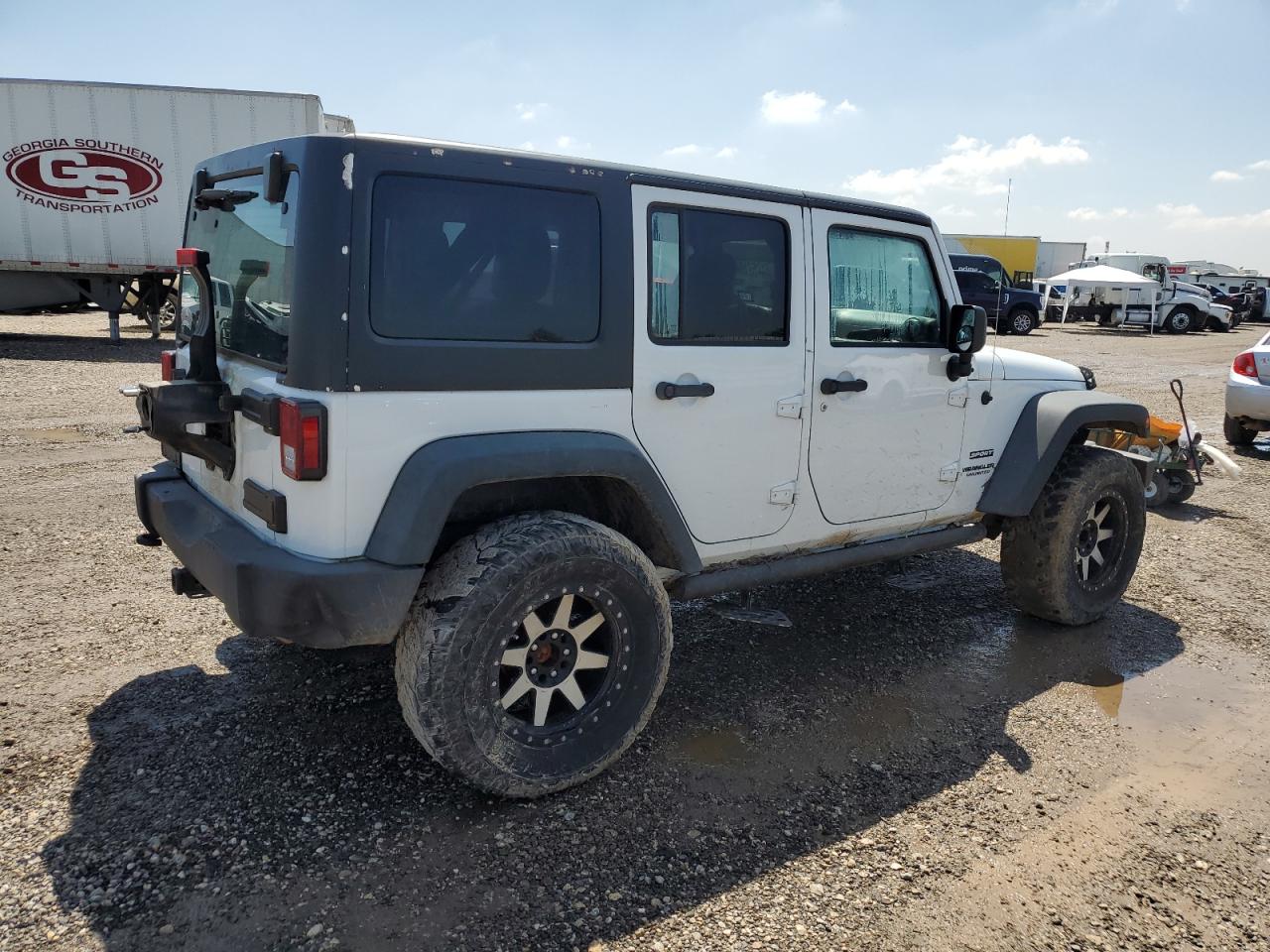 1C4BJWDG7EL109979 2014 Jeep Wrangler Unlimited Sport