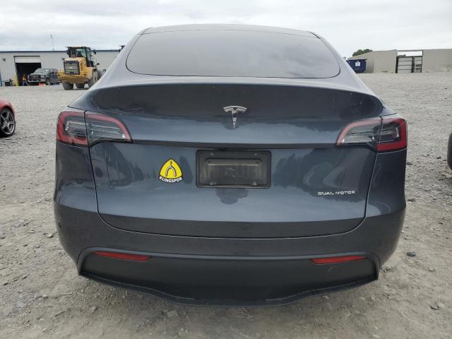 2023 Tesla Model Y VIN: 7SAYGDEE9PF928611 Lot: 54668464