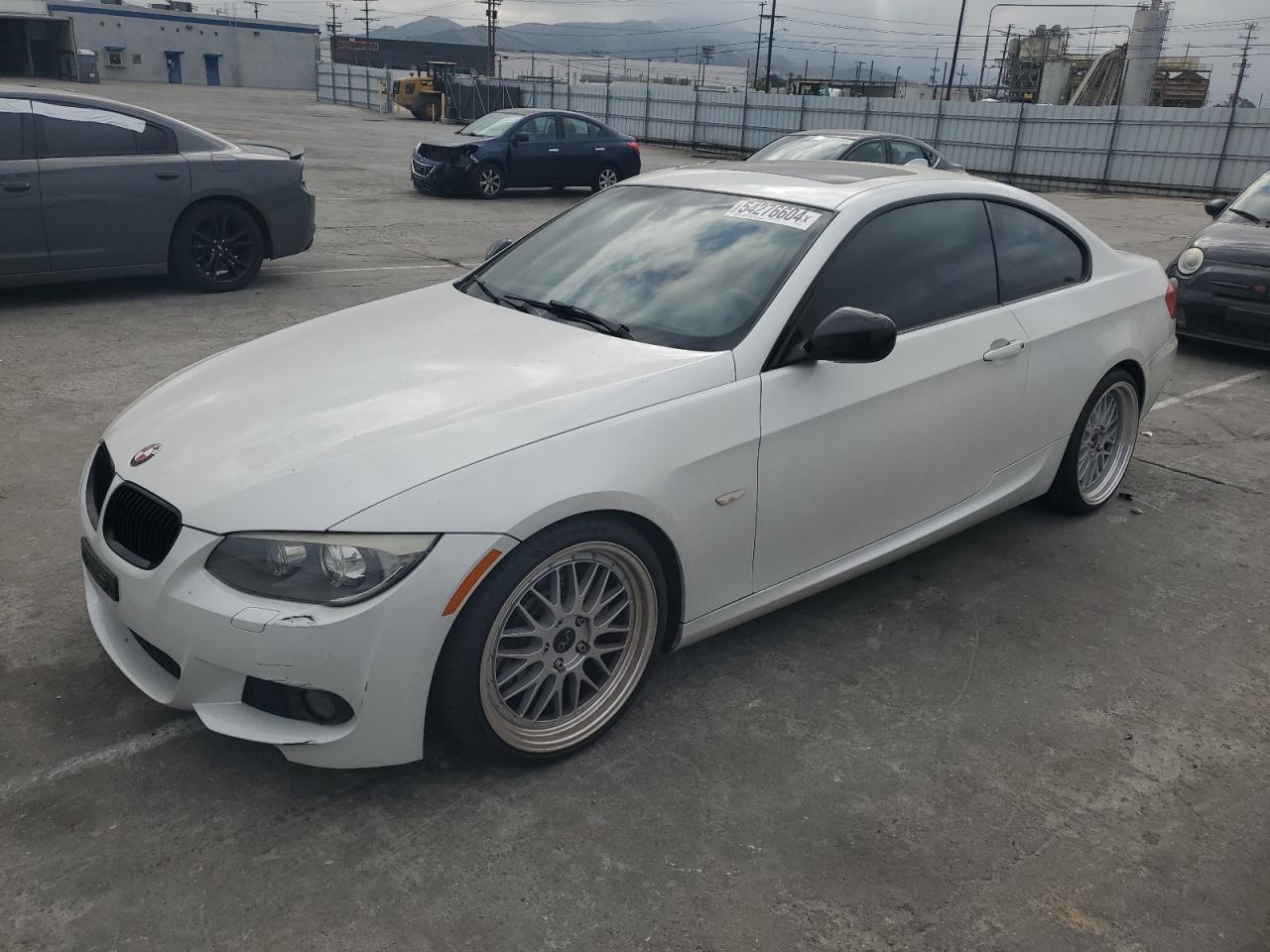 WBAKG7C59BE599049 2011 BMW 335 I