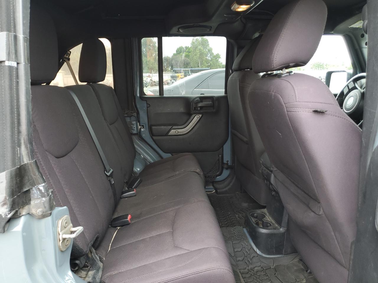 1C4HJWDG2EL106210 2014 Jeep Wrangler Unlimited Sport