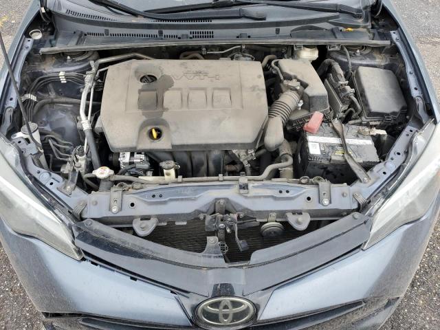 VIN 5YFBURHE1HP686584 2017 Toyota Corolla, L no.11