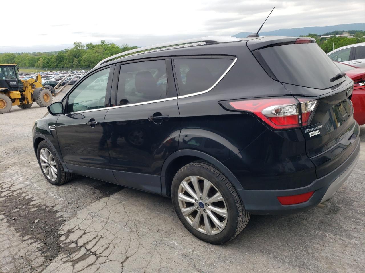 1FMCU0J98HUC84850 2017 Ford Escape Titanium