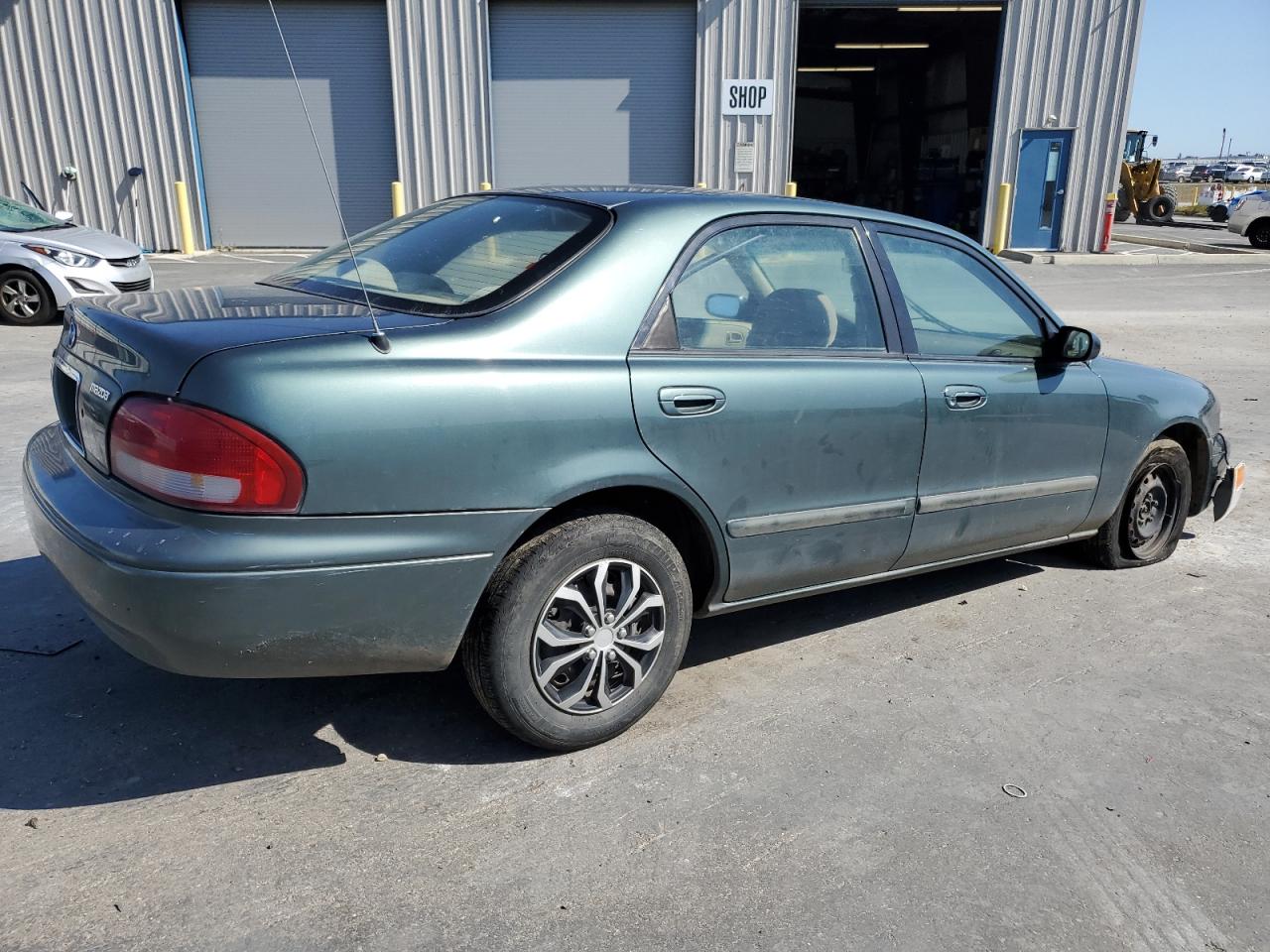 1YVGF22CXW5693035 1998 Mazda 626 Dx