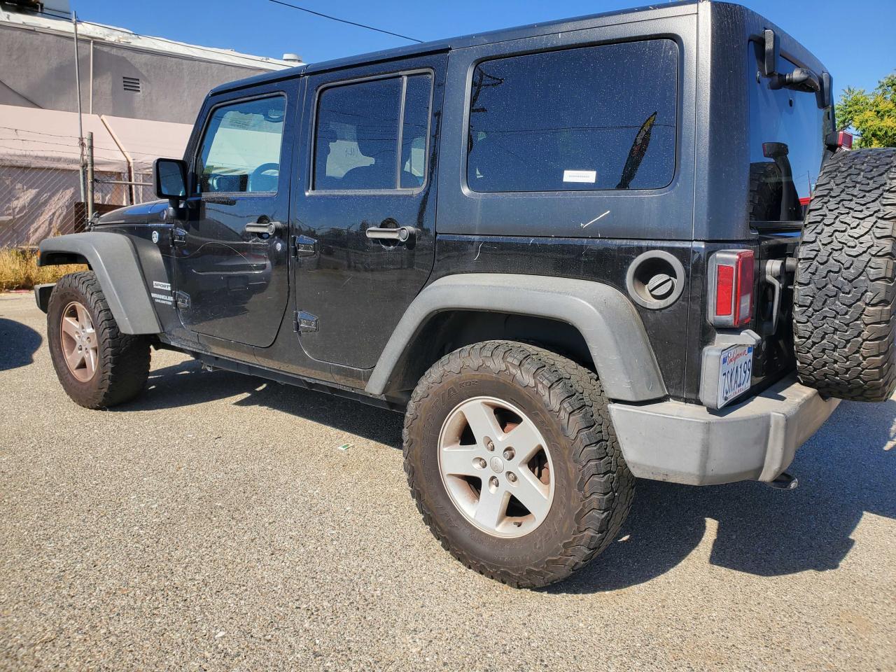 1C4BJWDG3GL215591 2016 Jeep Wrangler Unlimited Sport