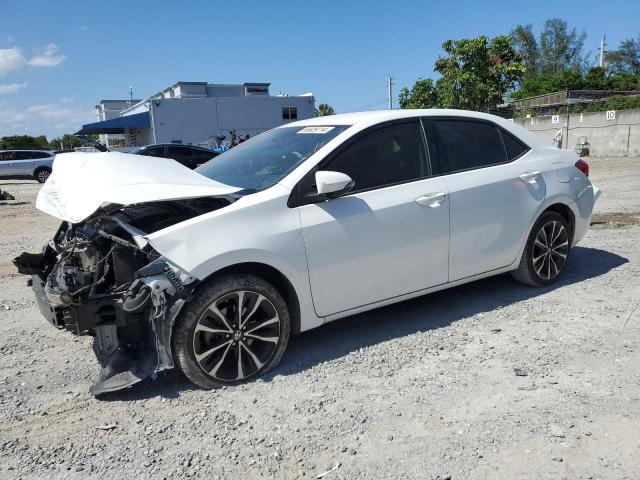 VIN 5YFBURHEXKP902634 2019 Toyota Corolla, L no.1