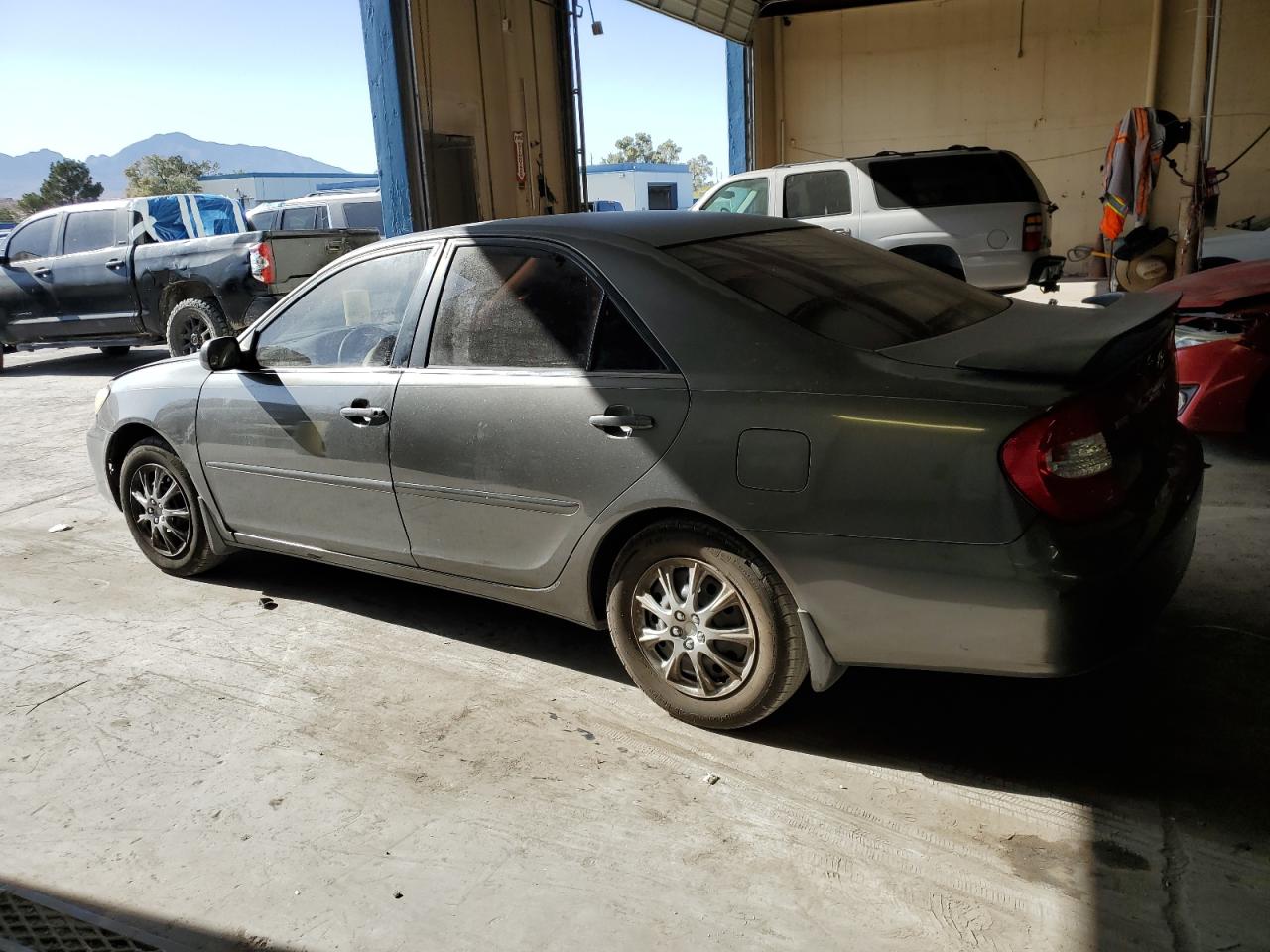 JTDBE32K230236552 2003 Toyota Camry Le