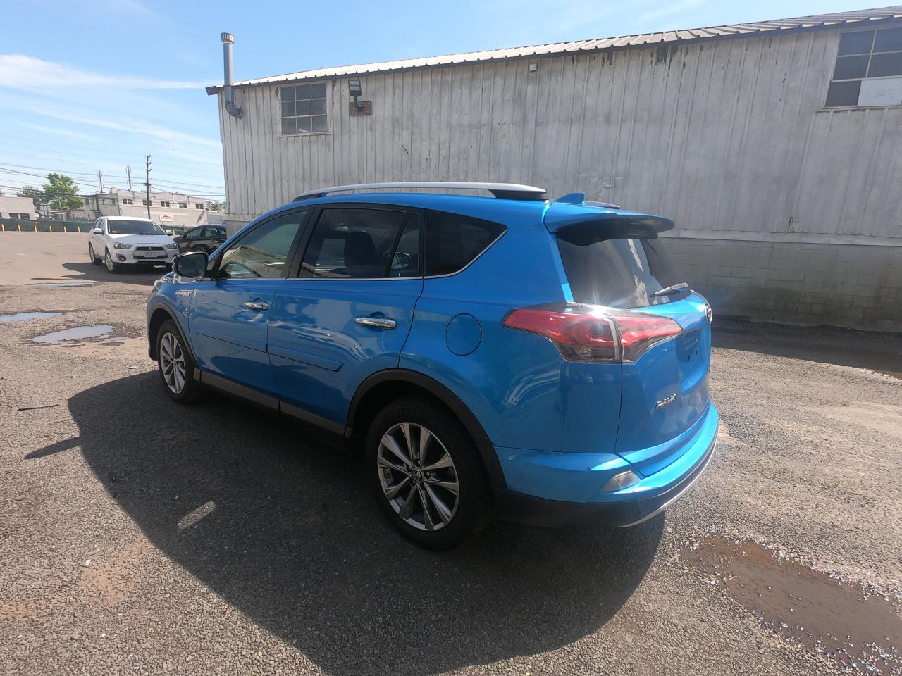 2016 Toyota Rav4 Hv Limited vin: JTMDJREVXGD017074