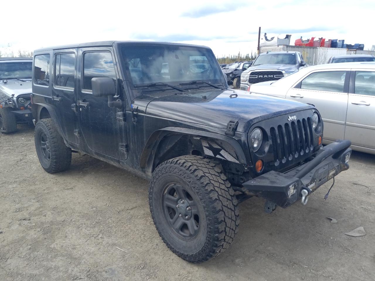 1C4BJWDG9DL670134 2013 Jeep Wrangler Unlimited Sport