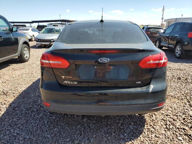 2018 Ford Focus Se VIN: 1FADP3F21JL224083 Lot: 54678694