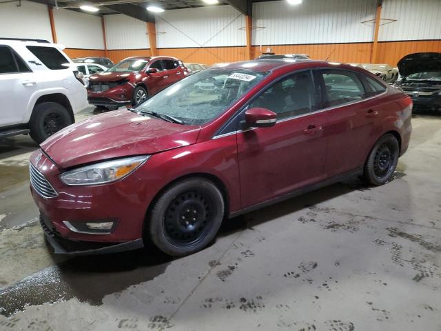 2016 Ford Focus Titanium VIN: 1FADP3J22GL316674 Lot: 53440294