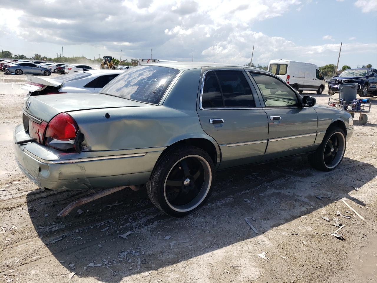 2MEFM74W75X641854 2005 Mercury Grand Marquis Gs