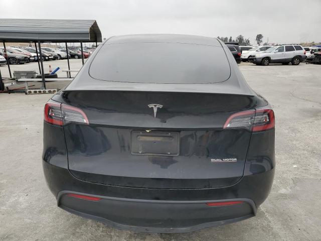 2023 Tesla Model Y VIN: 7SAYGDEFXPF744321 Lot: 55551994
