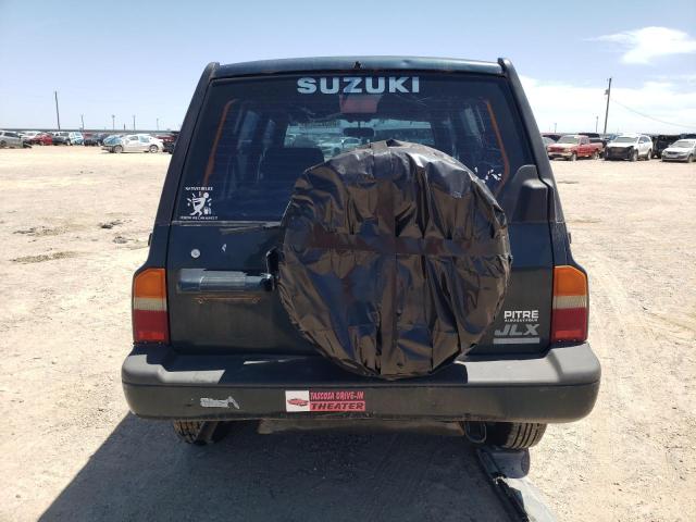 1994 Suzuki Sidekick Jx VIN: JS3TD03VXR4106679 Lot: 56522524